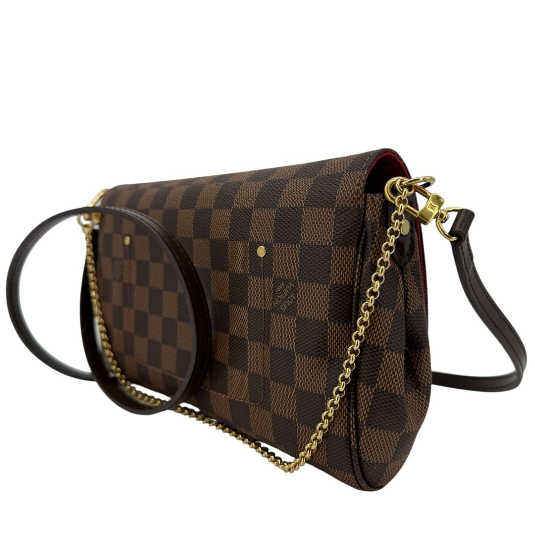 Louis Vuitton Damier Ebene Favorite MM Bag | LuxLoveLouis showcasing its elegant design and versatile straps.