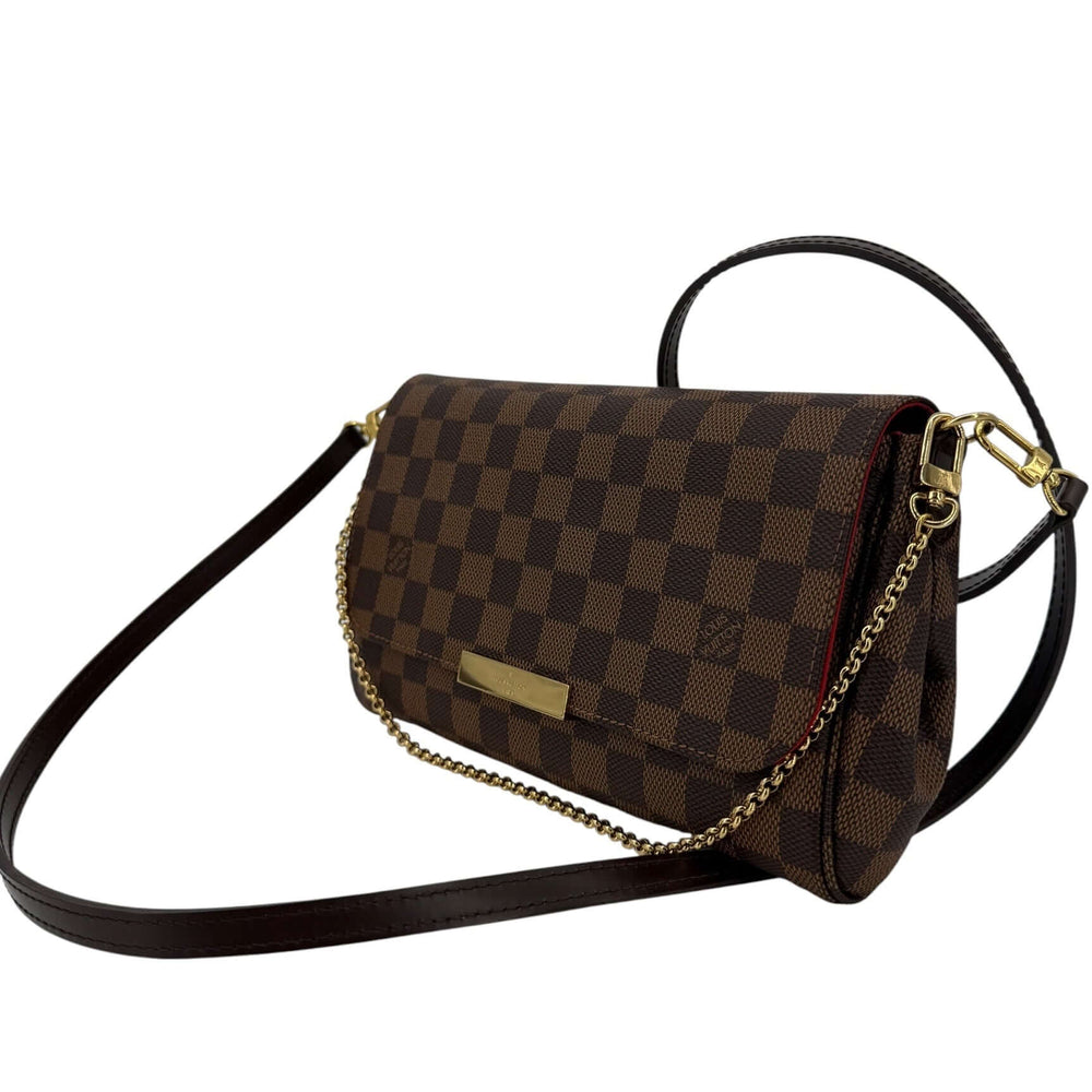 Louis Vuitton Damier Ebene Favorite MM Bag | LuxLoveLouis side view with chain strap on a white background.