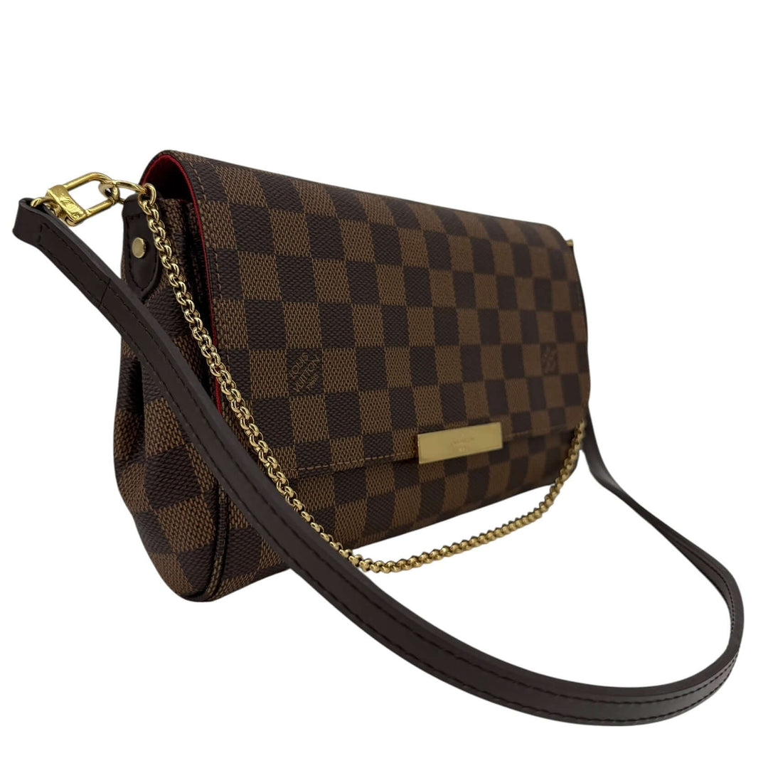 Louis Vuitton Damier Ebene Favorite MM Bag | LuxLoveLouis side view showcasing chic checked canvas and gold-tone detailing.