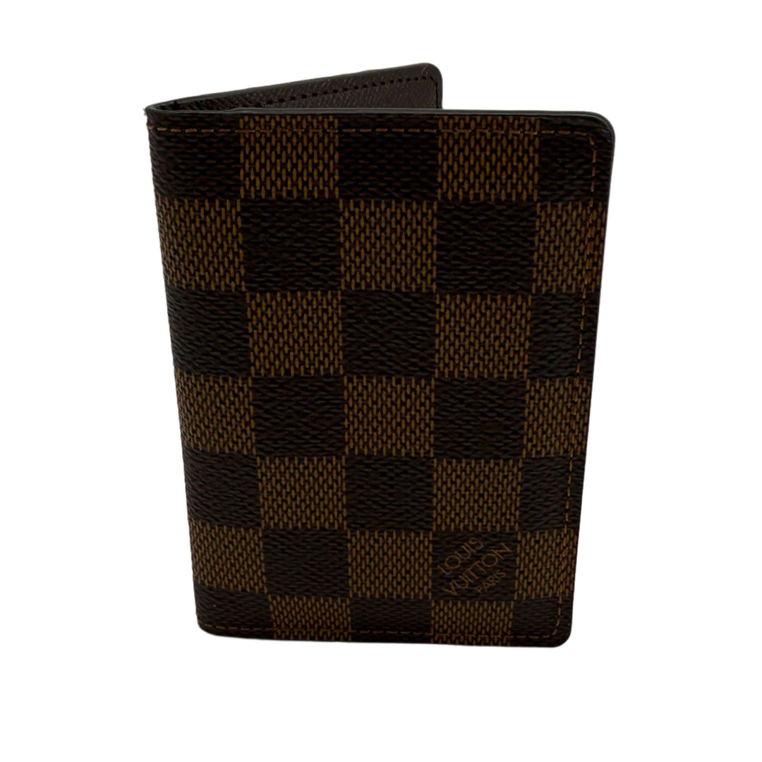 Louis Vuitton Damier Ebene Pocket Organizer NM, showcasing signature coated canvas in a compact design.