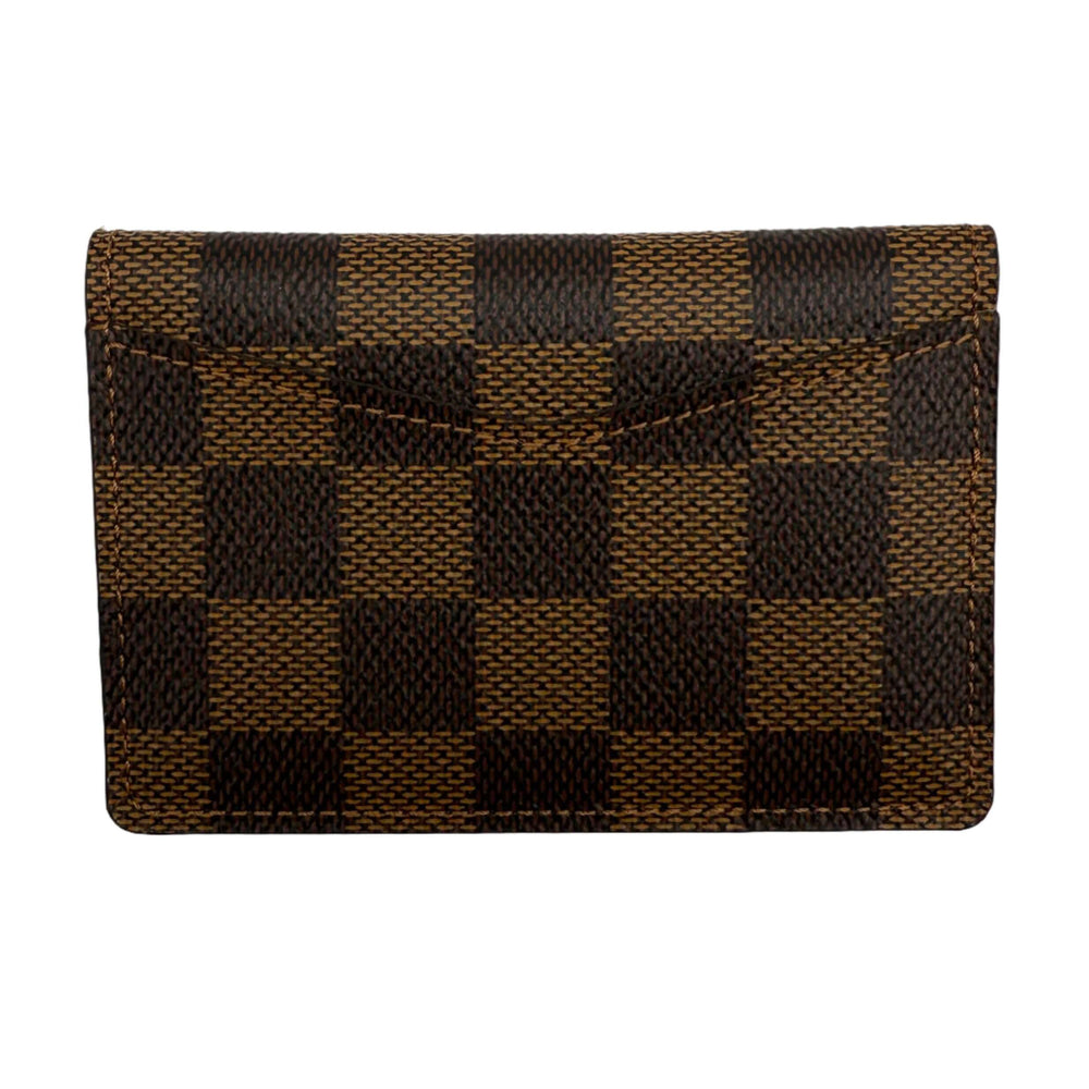 Louis Vuitton Damier Ebene Pocket Organizer NM showcasing its signature checkered canvas design.