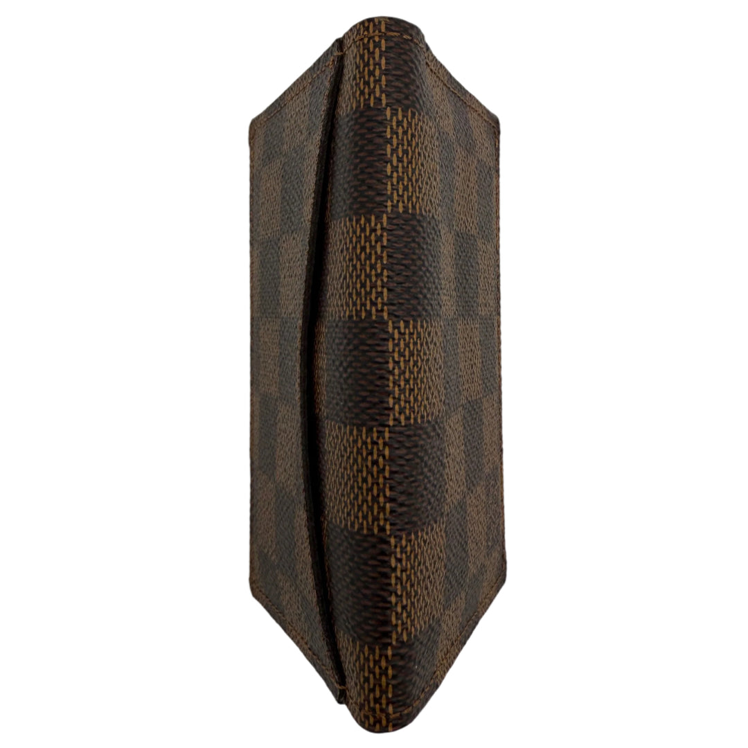 Louis Vuitton Damier Ebene Pocket Organizer NM, compact luxury wallet with signature coated canvas design.