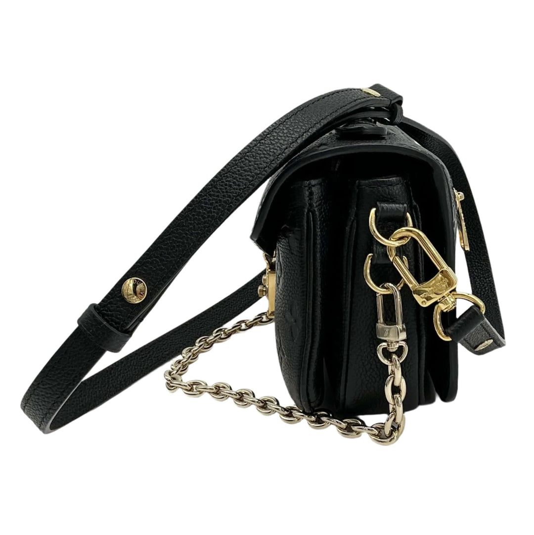 Louis Vuitton Empreinte Pochette Metis East West in black, featuring supple leather and elegant chain strap.