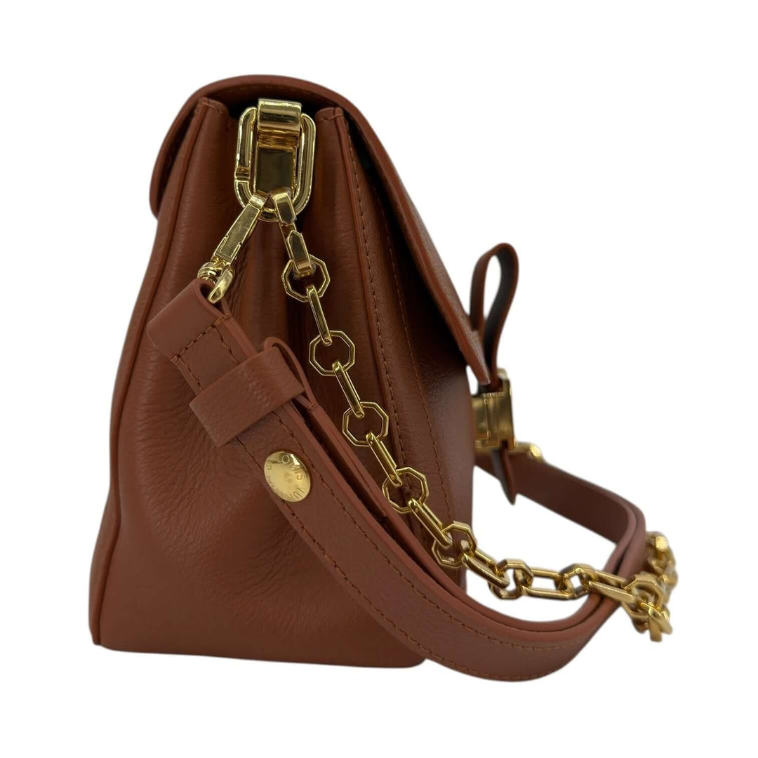 Louis Vuitton Leather Shoulder Bag with LV Turn-Lock Chain Strap Brown side view showcasing chain detail and brown leather.