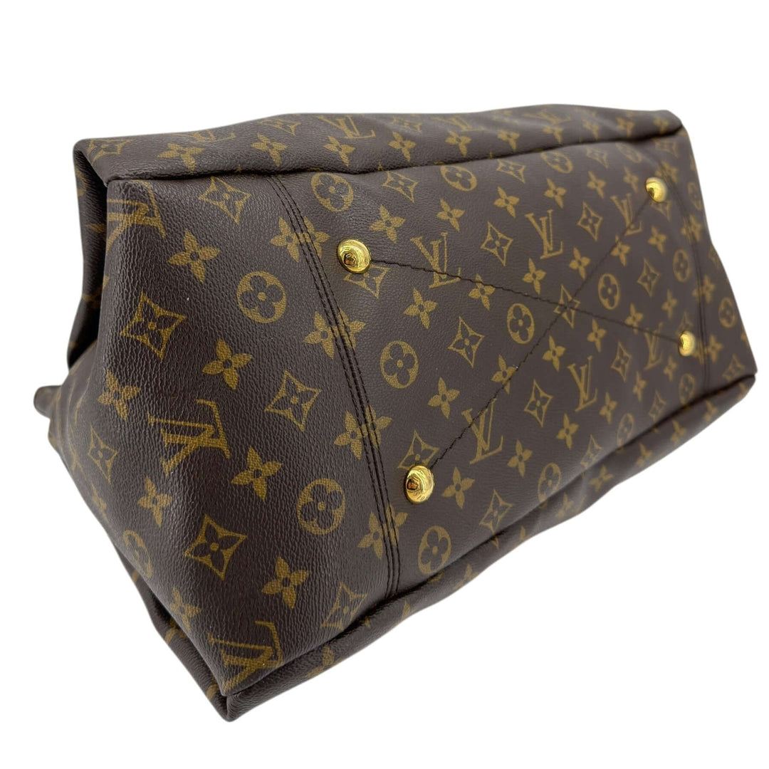 Louis Vuitton Monogram Artsy MM Shoulder Bag Brown base view showcasing monogram print and gold-tone hardware.