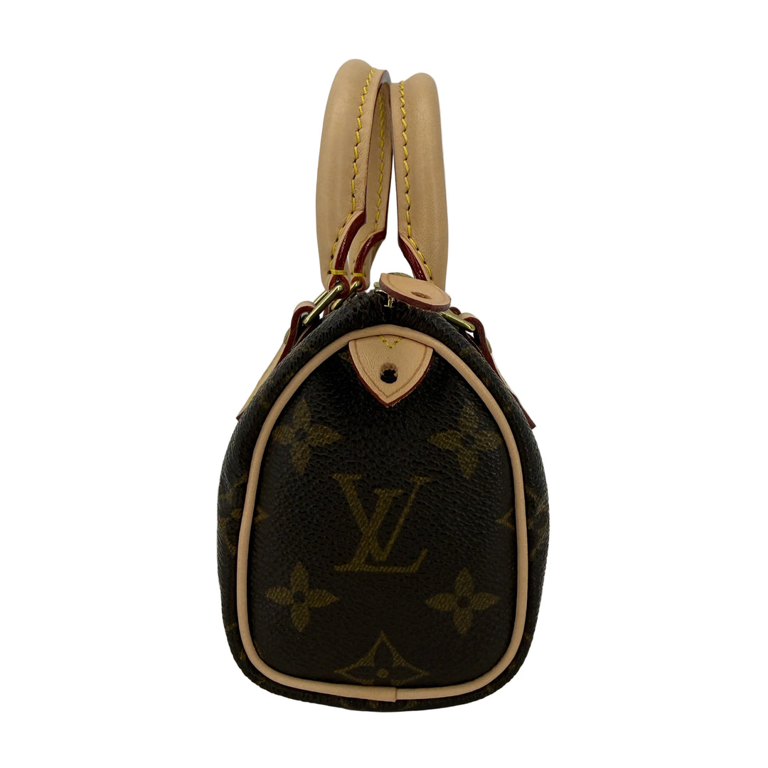 Louis Vuitton Mini HL Speedy handbag front view showing Monogram canvas and refreshed Vachetta leather details.