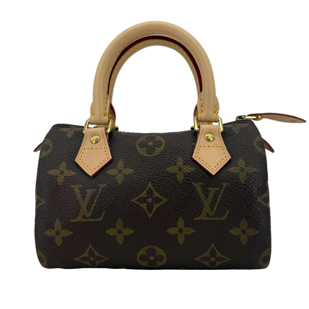 Louis Vuitton Mini HL Speedy handbag featuring Monogram canvas and refreshed Vachetta leather handles.