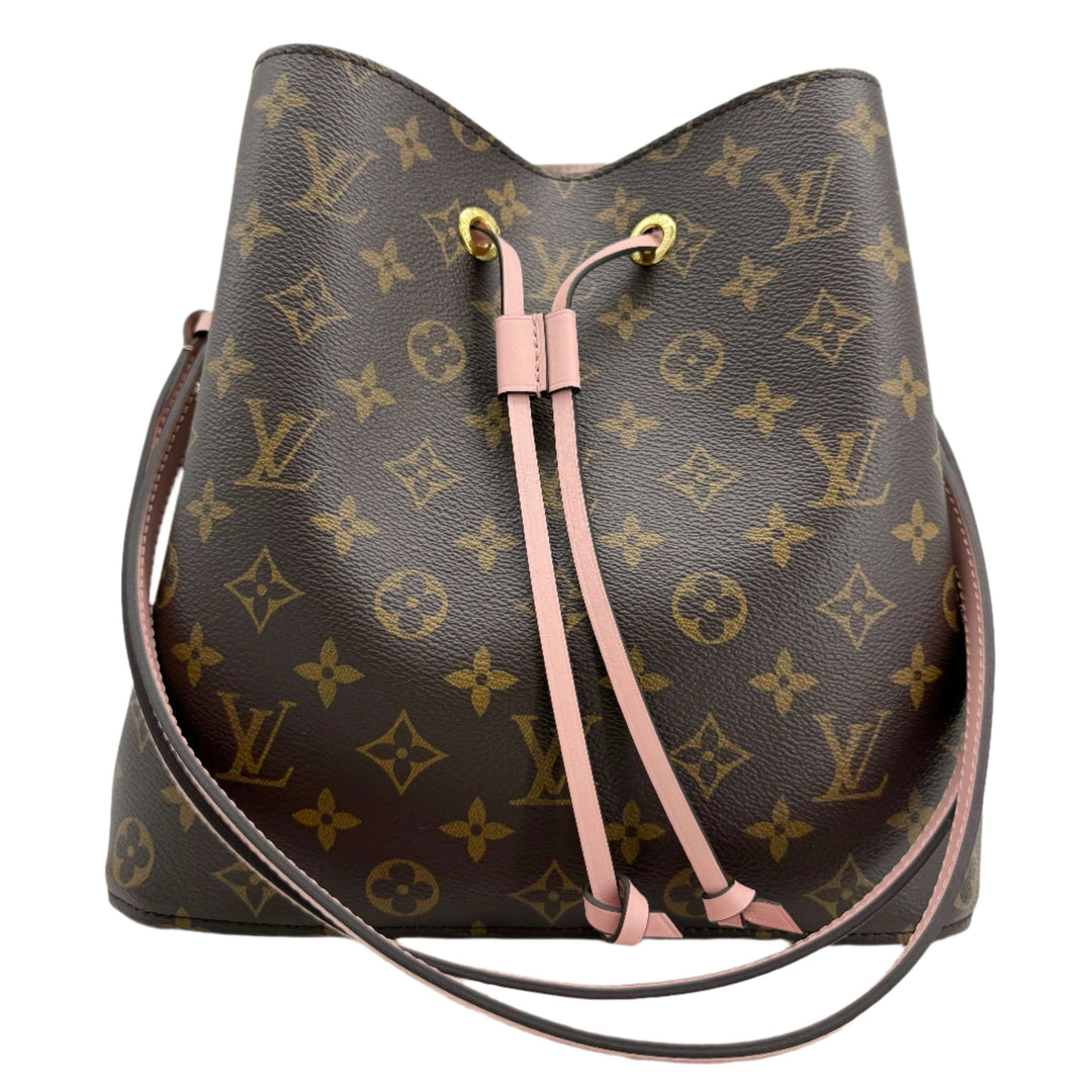 Louis Vuitton Monogram Néonoé MM bucket bag in classic monogram with soft pink trim and gold hardware.