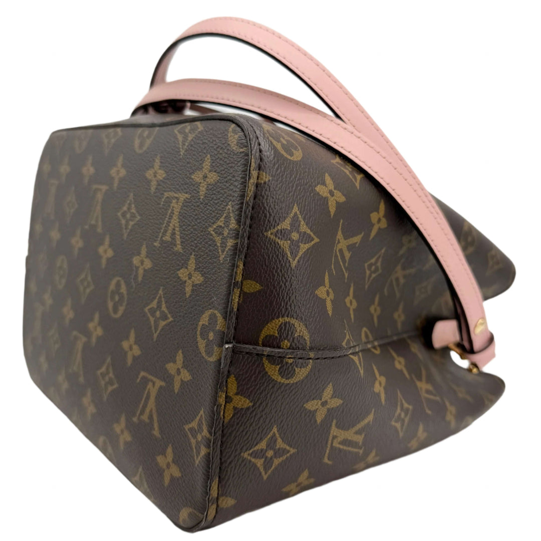 Louis Vuitton Monogram Néonoé MM bucket bag in soft pink—elegant design with gold hardware and adjustable strap.