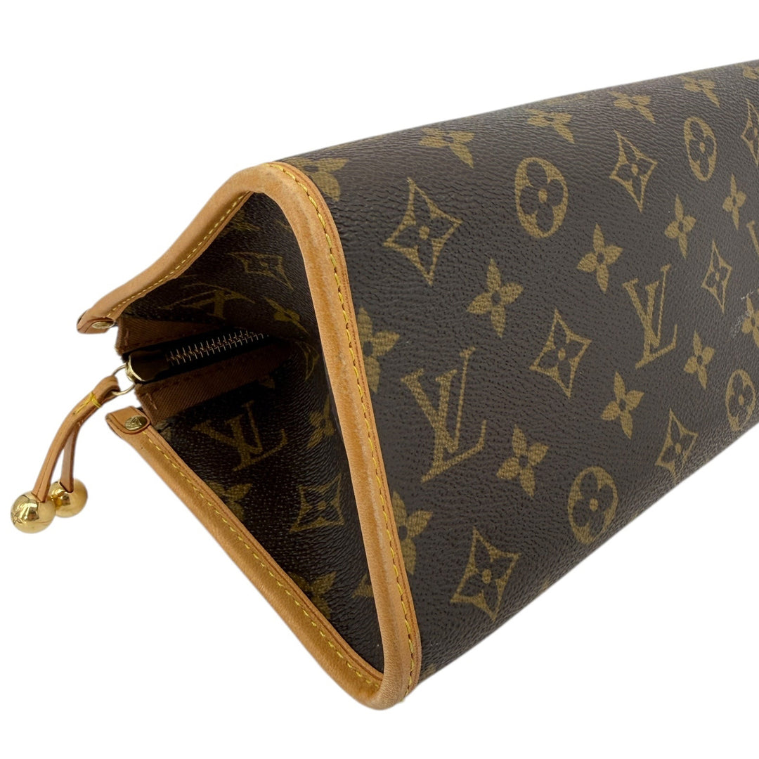 Louis Vuitton Monogram Popincourt Top Handle Handbag close-up showing monogram canvas and leather trim details.