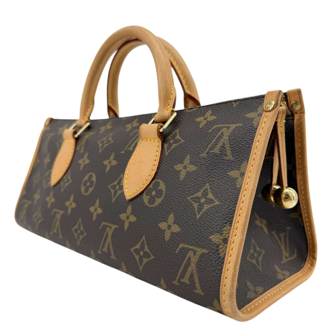 Louis Vuitton Monogram Popincourt Top Handle Handbag in Monogram coated canvas and vachetta leather, showcasing elegant design.