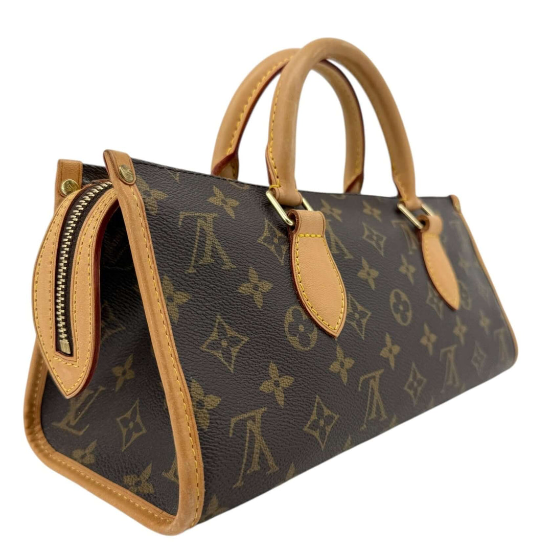 Louis Vuitton Monogram Popincourt Top Handle Handbag showcasing its iconic design and vachetta leather trim.