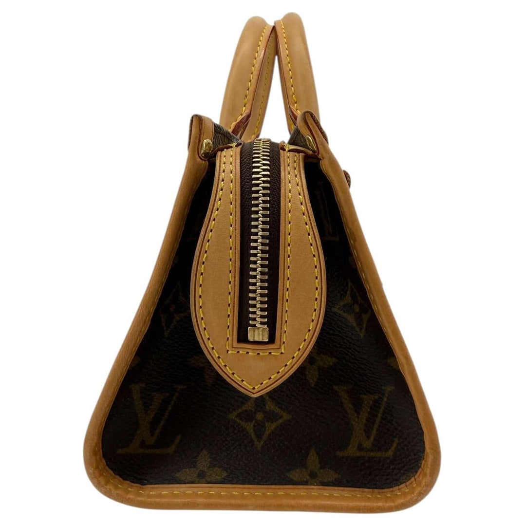 Louis Vuitton Monogram Popincourt Top Handle Handbag side view highlighting the zipper and vachetta leather trim.
