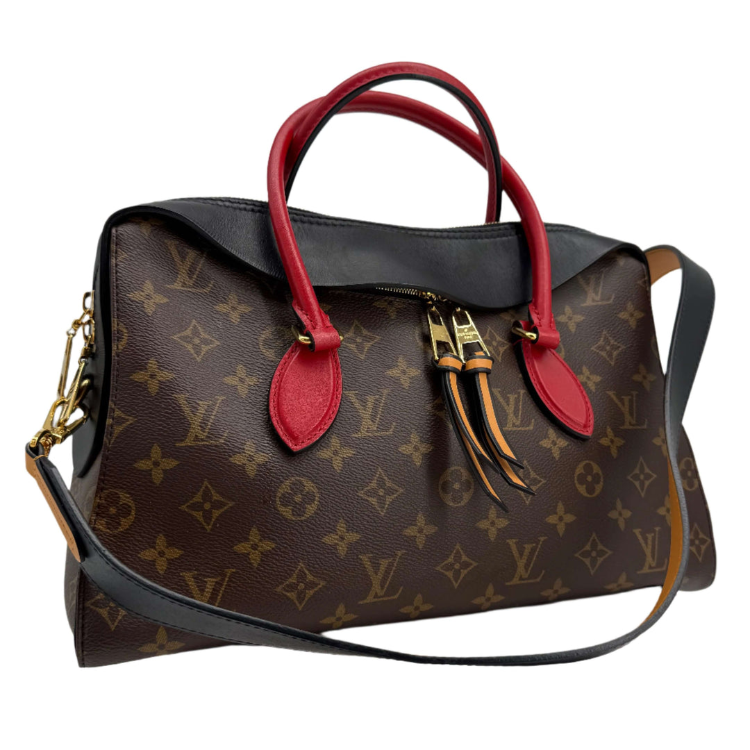 Louis Vuitton Monogram Tuileries Shoulder Bag in black with red handles and caramel interior, showcasing luxury craftsmanship.