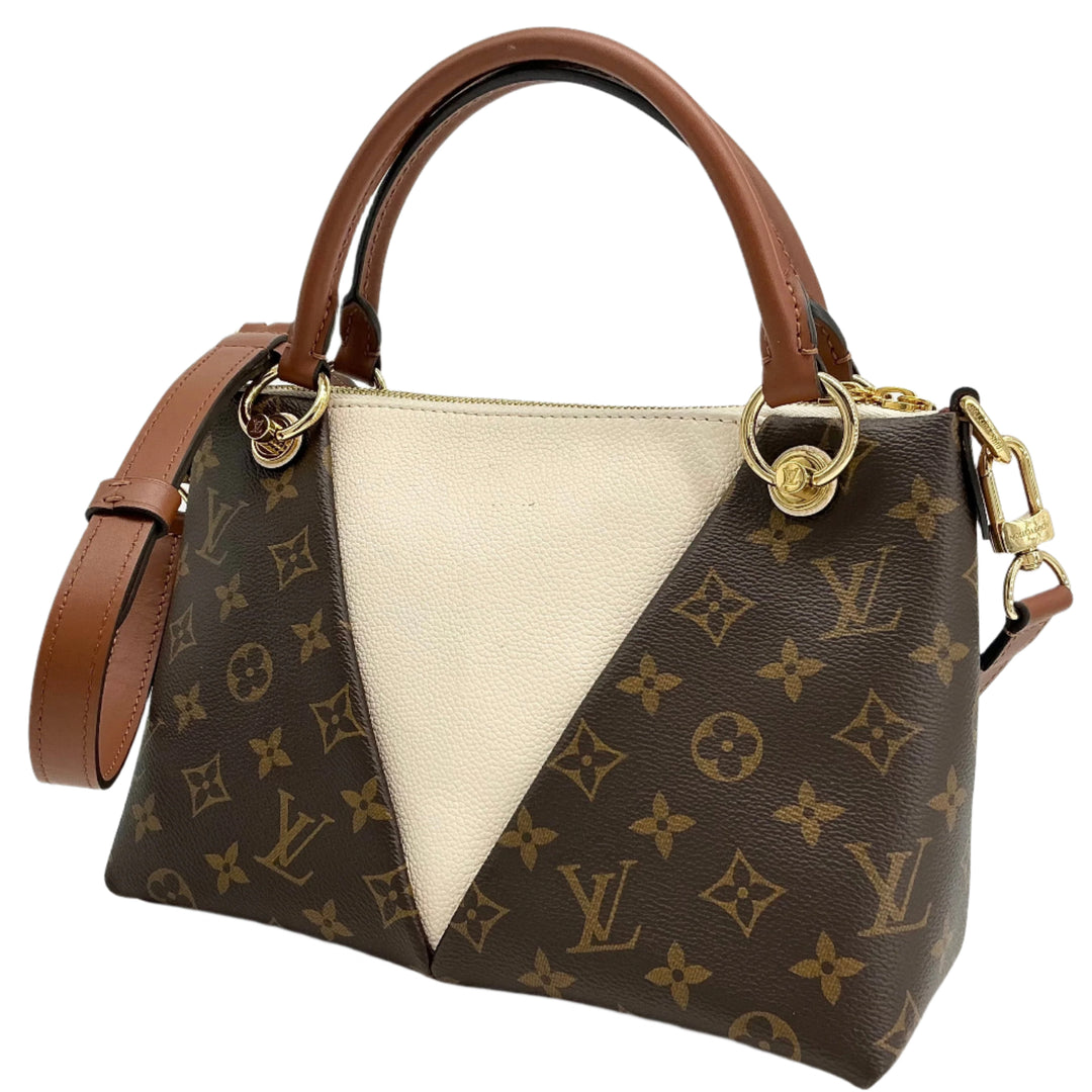 Louis Vuitton Monogram V Tote BB in creme with ivory and golden brown leather trim, showcasing classic design and luxury.