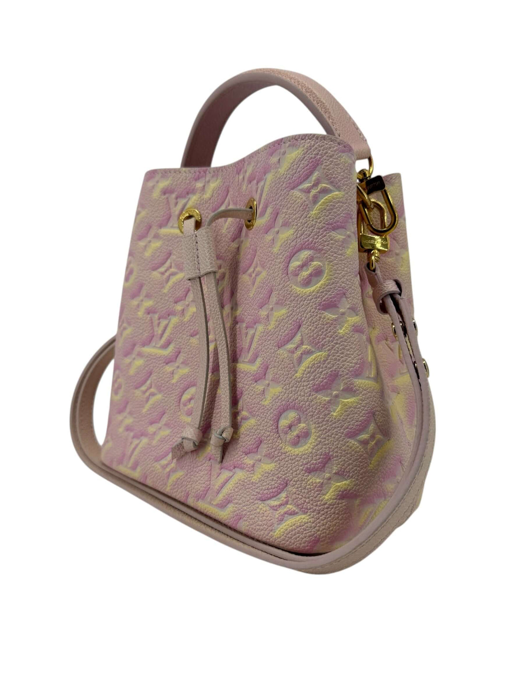 Louis Vuitton Empreinte Monogram Summer Stardust Néonoé BB Bucket Bag Pink in Monogram Empreinte leather with gold tone hardware.