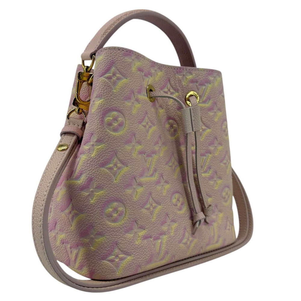Louis Vuitton Empreinte Monogram Summer Stardust Néonoé BB Bucket Bag Pink, pink yellow cream spray finish, gold-tone hardware, adjustable leather strap.