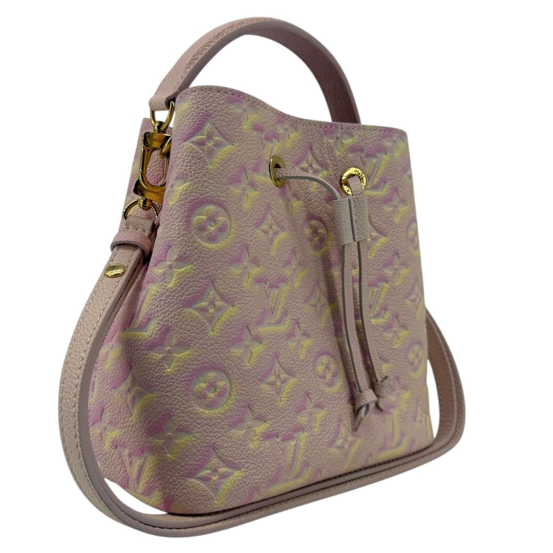 Louis Vuitton Empreinte Monogram Summer Stardust Néonoé BB Bucket Bag Pink, pink yellow cream spray finish, gold-tone hardware, adjustable leather strap.