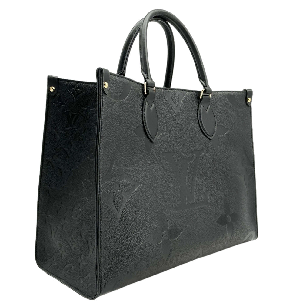 Louis Vuitton Onthego MM Tote Bag in black Monogram Empreinte leather, showcasing stylish design and luxurious craftsmanship.