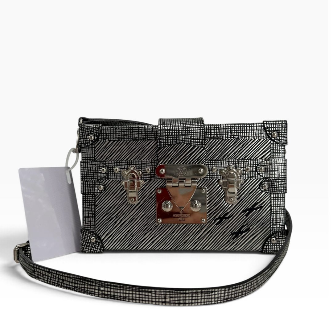 Louis Vuitton Petite Malle metallic silver-and-black trunk bag, front view with silver-tone lock and matching strap
