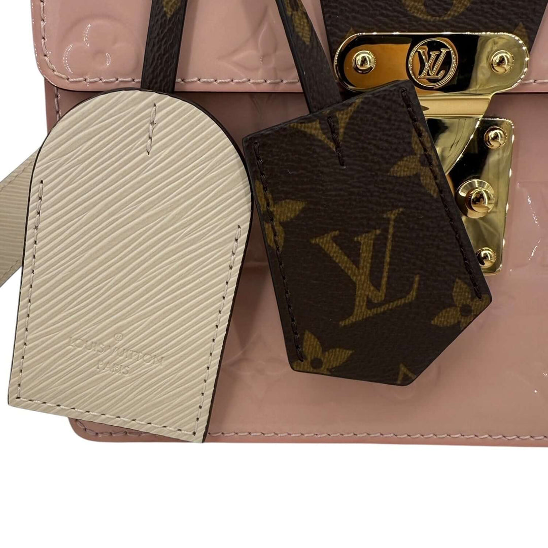 Louis Vuitton Vernis Spring Street Rose Ballerine Bag | LuxLoveLouis with decorative tags and gold hardware detail