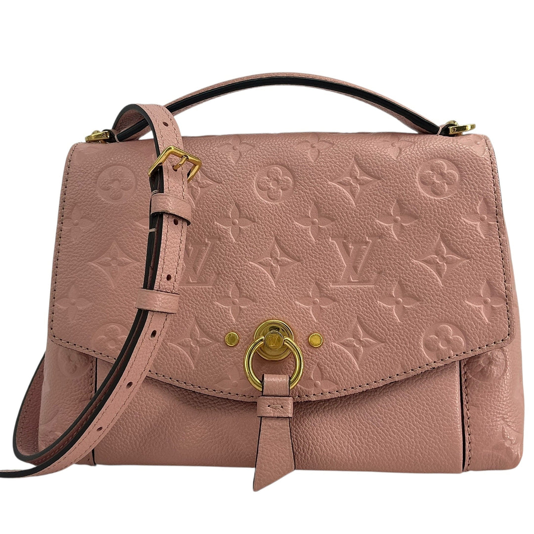 A pink Louis Vuitton monogram shoulder bag with a top handle, adjustable shoulder strap, and gold-tone hardware, shown against a plain white background.