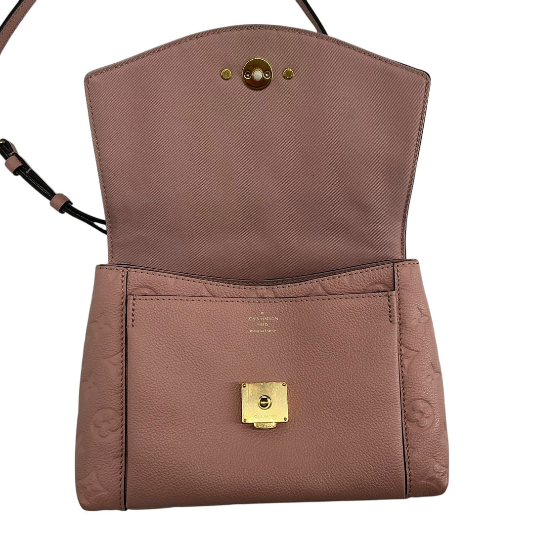 Louis Vuitton Blanche BB open flap and gold tone press loc