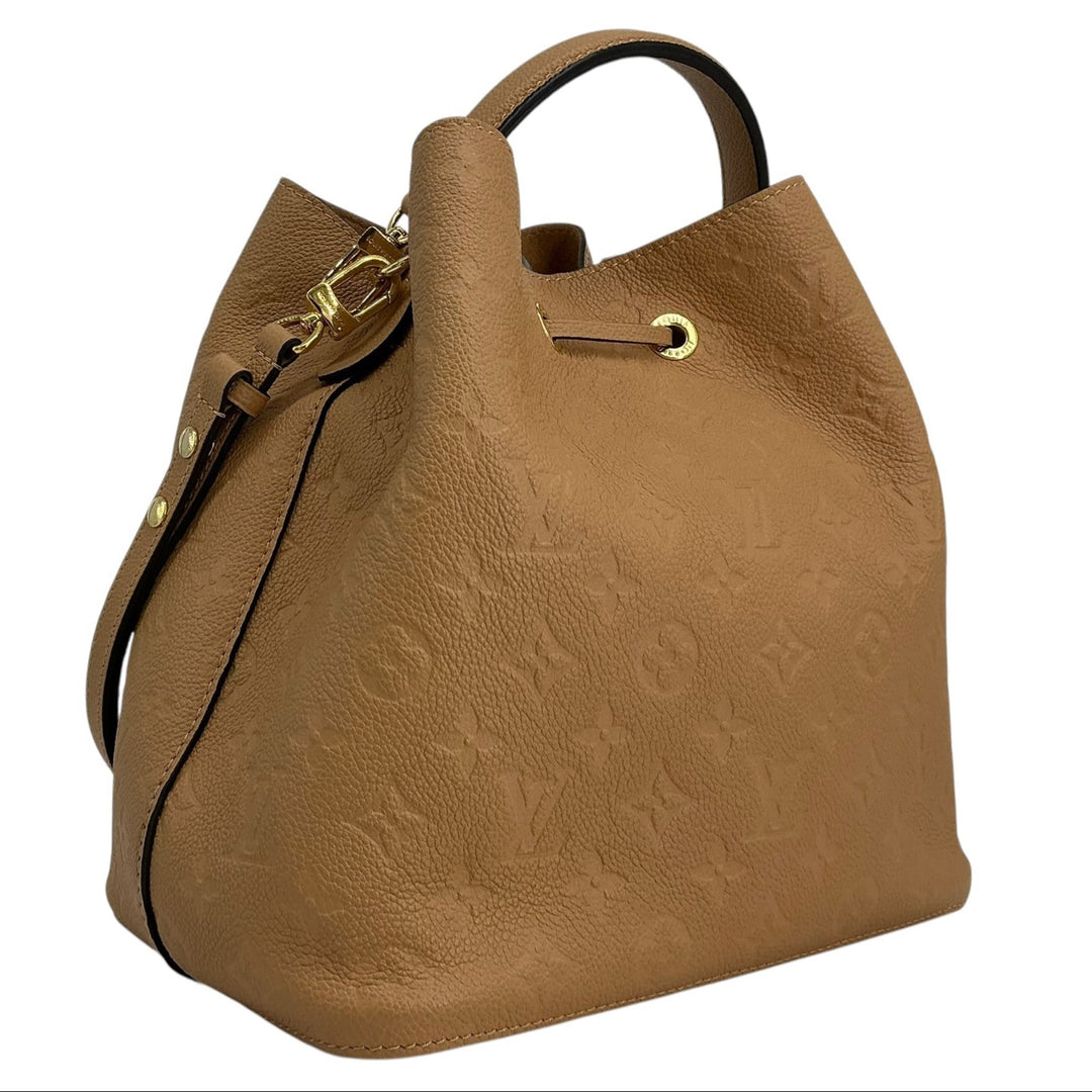 Louis Vuitton NéoNoé MM Arizona angled rear showing embossed leather and removable strap