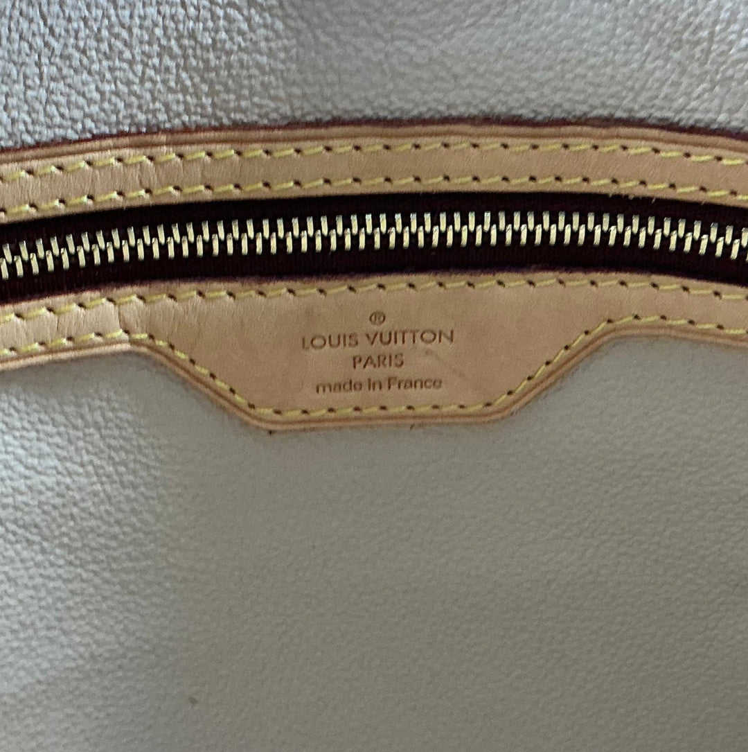 Louis Vuitton Monogram Bucket Bag interior zip pocket and Made in France stamp