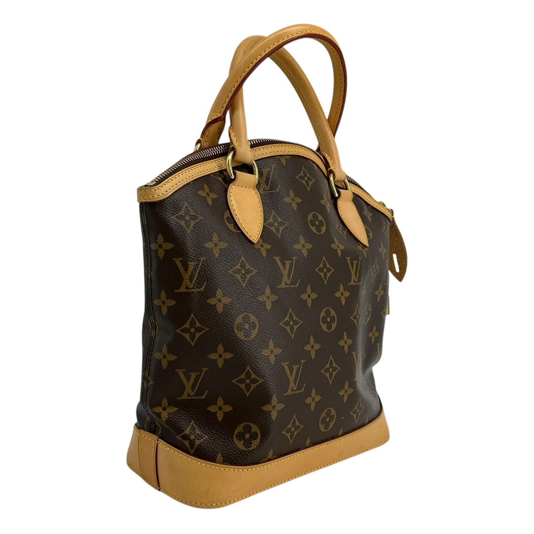 Louis Vuitton Lockit PM rear angled Monogram canvas exterior with rolled leather handles