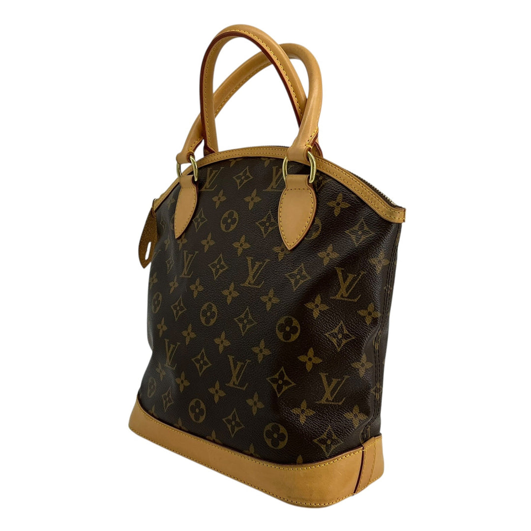 Louis Vuitton Monogram Lockit PM opposite angled exterior showing natural leather trim
