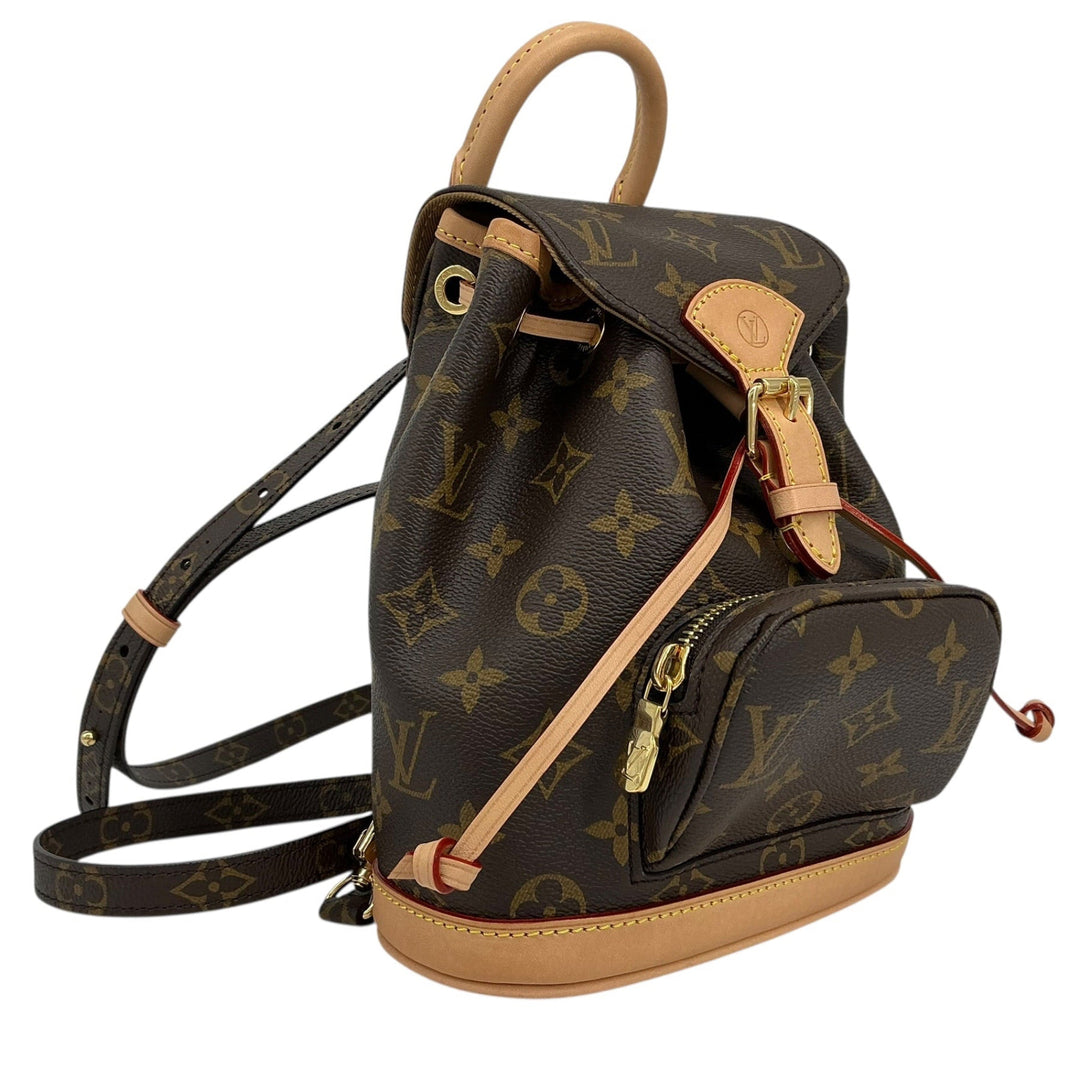 Louis Vuitton monogram canvas backpack with tan leather trim, top handle, and detachable shoulder strap, shown on a plain white background.