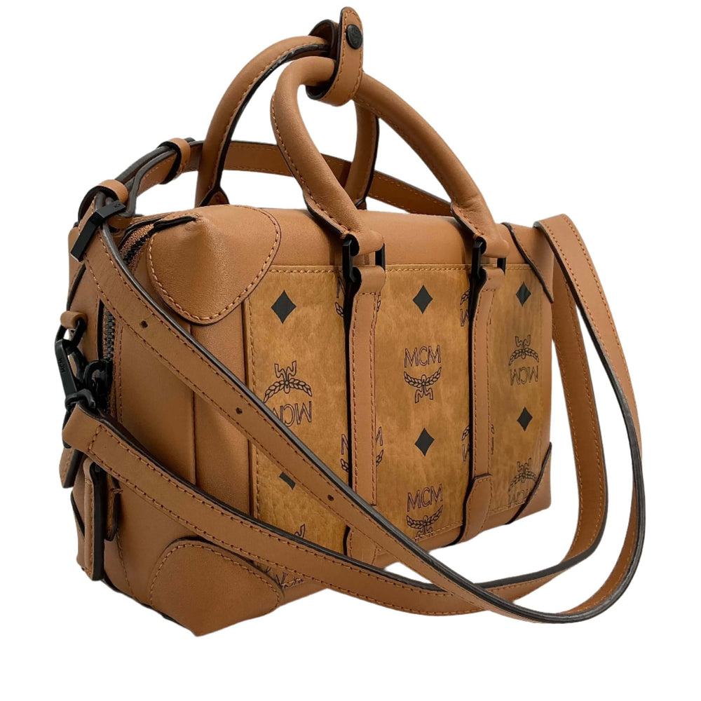 Fendi Zucca Mini Baguette in tobacco canvas with brown leather, featuring FF motif and elegant design.